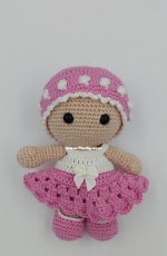 little doll in pink dress