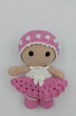 little doll in pink dress