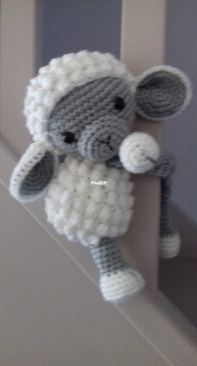 Lamb curtain tieback