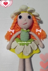 A doll in daisy costume
