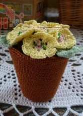 Yellow Pink and sparkly - Janet McMahon - Pot of primroses - free