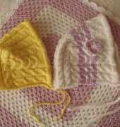 Cabled Baby Bonnet by Lena Swan