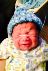 My grandson with a hat I made for him