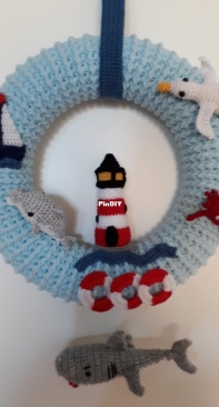 Mediterranean wreath with animals and lighthouse