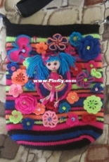 handbag with a doll
