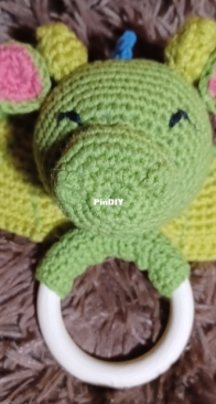 Crocheted dragon rattle