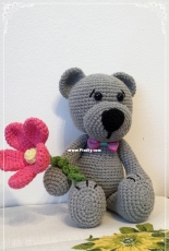 Teddy with flower.