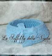 Crocheted light blue basket