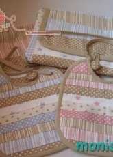 Twin set. Baby changers and bib.