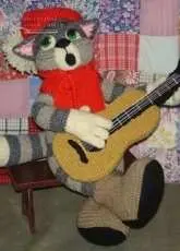Ilona Klavdia - Cat with guitar - Spanish - Translated
