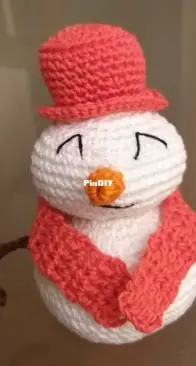 Snowman with a red hat