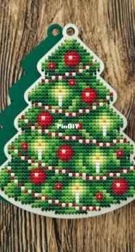 Christmas Tree With Candles Ornament by Natasha Pushkina