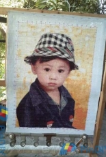 Boy with caro hat