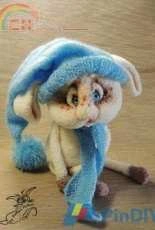 Little Owls Hut- Svetlana Pertseva - Rabbit in a blue hat - Spanish- Translated