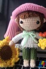 The little girl picked flowers