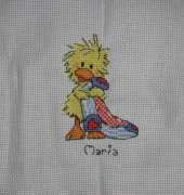 A baby cross stitching