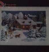 Hombre a caballo en la nieve