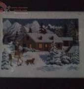 Hombre a caballo en la nieve