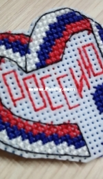 Cross stitch icon on plastic