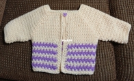 Crocheted cardigan for baby girl