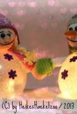 Heikes Hakelzoo -Luminous Angel and Illuminated snowman in love - German