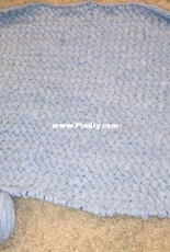 Turning old t shirts into a rug!