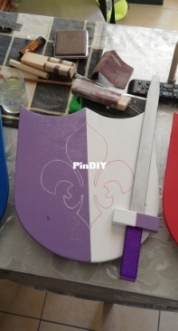 hand drawn wooden shields