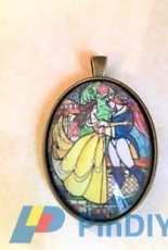 Beauty & the Beast necklace pendant in bronze