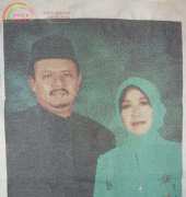 my mom and dad on cross stitch