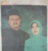 my mom and dad on cross stitch