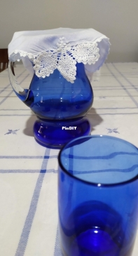 Water jug cover with  crocheted  borders
