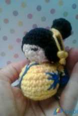 Yellow kokeshi