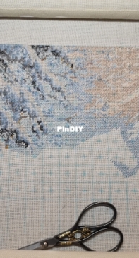 The process of embroidery Anchor Horses in the best of the setting sun by the stream