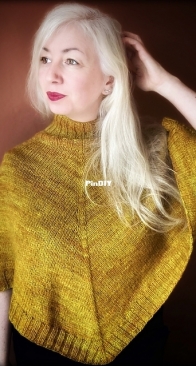 Coorie in Poncho by Amy Palko