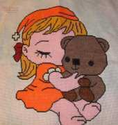 nina con oso