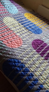 Orbie quilt by Michael Caputo
