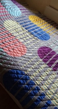 Orbie quilt by Michael Caputo