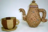 Tetera y pocillo en tela