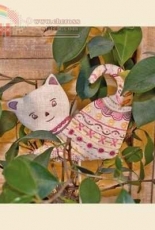 Un chat dans laiguille Pique fleurs chat