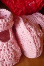 Pink bootie with flower button
