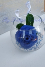 Blue rose in bowl