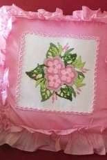Pillow with pink flowers