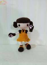 Girl wearing a bears paw