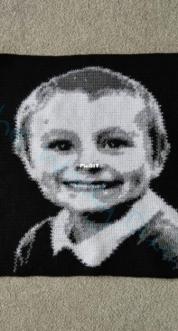 Crochet Portrait using black , white and grey colors