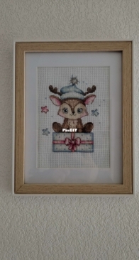 Renne sur son cadeau