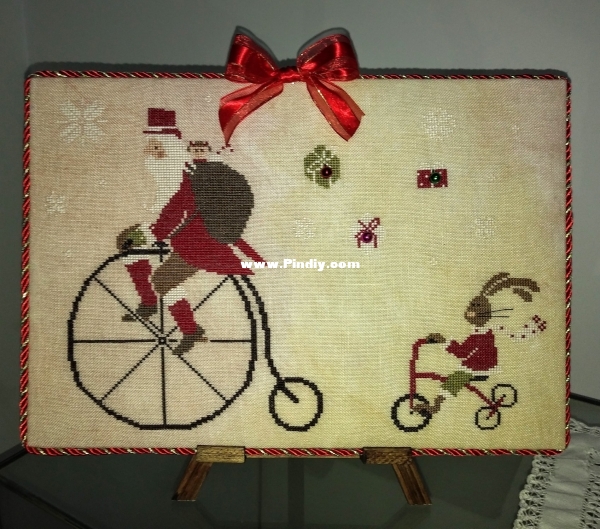 Madame Chantilly Santa on the Bike.jpg