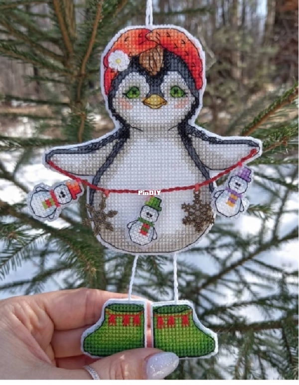 Penguin with snowman by Elena Shestakova.jpg